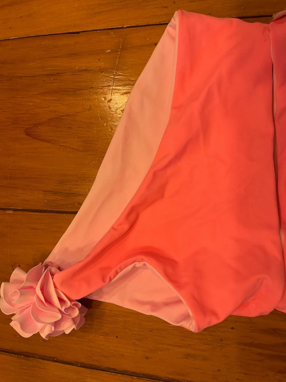 Snapper rock Girls' Neon Pink two Piece Swimsuit. With flower on shoulder UV50+